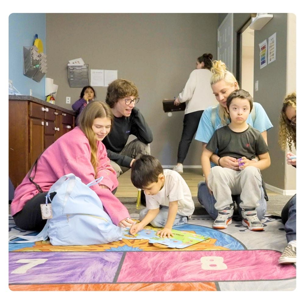 Children and therapists during group activity at Treetop ABA center